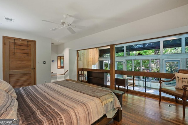 1144 Evergreen Dr NE, Atlanta, GA 30319 - bedroom featuring dark wood finished floors, visible vents, and multiple windows