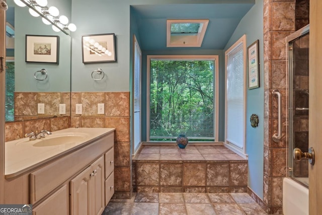 1144 Evergreen Dr NE, Atlanta, GA 30319 - bathroom featuring stone finish floor and vanity