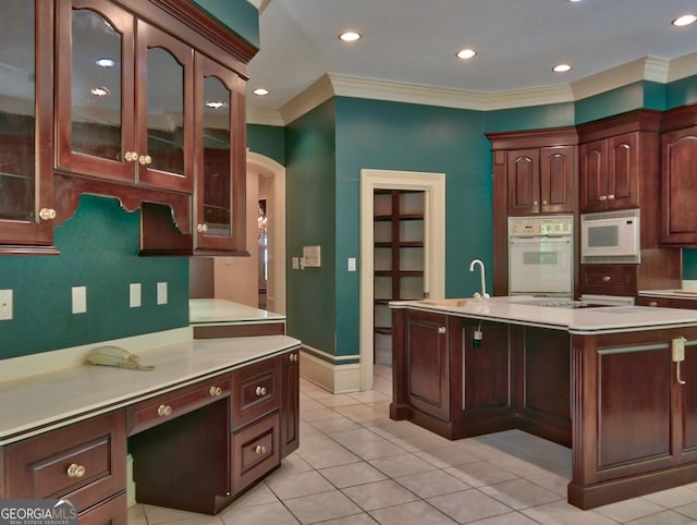 kitchen featuring white appliances, light tile patterned floors, glass insert cabinets, arched walkways, and light countertops