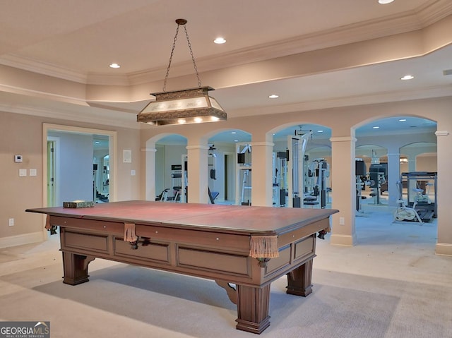 recreation room with recessed lighting, ornamental molding, arched walkways, baseboards, and decorative columns