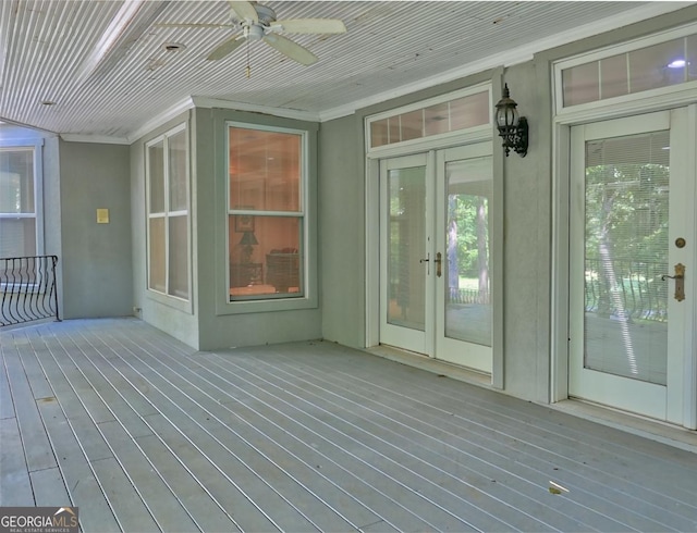 wooden deck with ceiling fan
