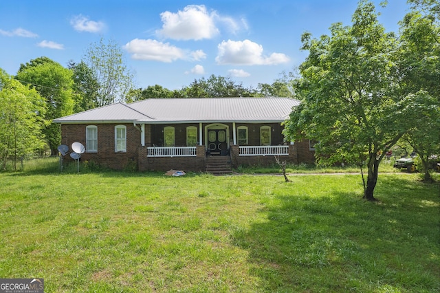 1009 Liberty Church Rd NE, Ranger, GA 30734 - ranch-style home with a porch, a front lawn, metal roof, and brick siding