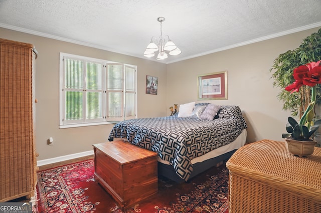 1009 Liberty Church Rd NE, Ranger, GA 30734 - bedroom with a chandelier, baseboards, ornamental molding, and a textured ceiling