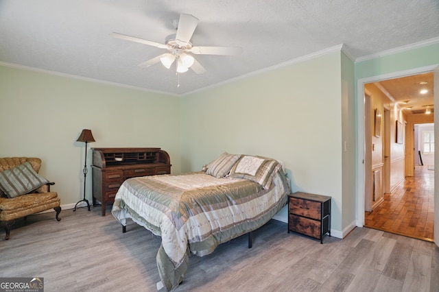 1009 Liberty Church Rd NE, Ranger, GA 30734 - bedroom featuring wood finished floors, crown molding, baseboards, and a ceiling fan