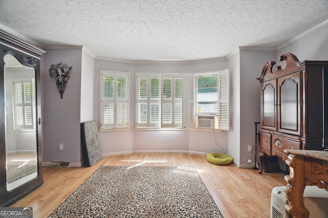1009 Liberty Church Rd NE, Ranger, GA 30734 - bedroom featuring wood finished floors, multiple windows, ornamental molding, baseboards, and a textured ceiling