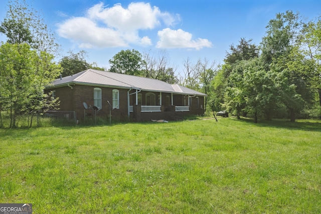 1009 Liberty Church Rd NE, Ranger, GA 30734 - single story home with brick siding, a front yard, and metal roof