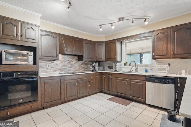 1009 Liberty Church Rd NE, Ranger, GA 30734 - kitchen with black appliances, a sink, light countertops, tasteful backsplash, and crown molding