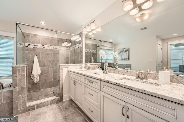 3699 School St, Chamblee, GA 30341 - full bath with double vanity, a shower stall, a tub to relax in, and plenty of natural light