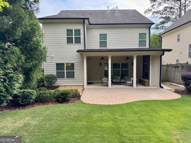3699 School St, Chamblee, GA 30341 - back of property with ceiling fan, a patio, and outdoor lounge area