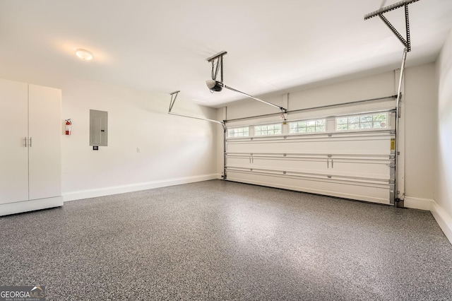 3699 School St, Chamblee, GA 30341 - garage with electric panel and a garage door opener