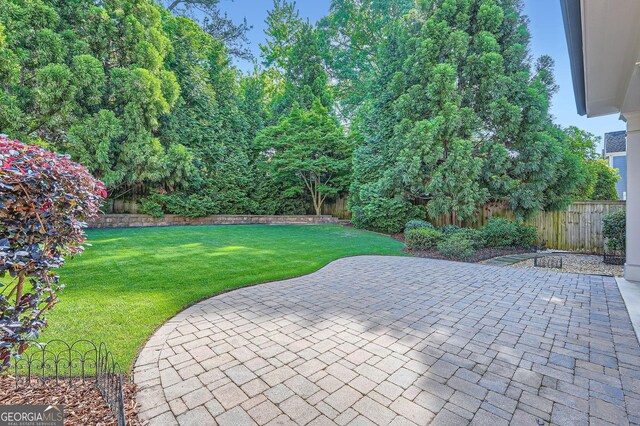 3699 School St, Chamblee, GA 30341 - fenced backyard with a patio