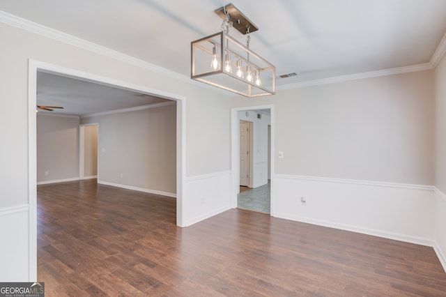 3987 Ivory Gables Pl, Buford, GA 30519 - unfurnished room featuring a chandelier, wood finished floors, crown molding, and baseboards