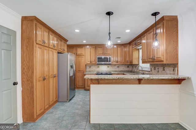 3987 Ivory Gables Pl, Buford, GA 30519 - kitchen featuring stainless steel appliances, a peninsula, light stone counters, tasteful backsplash, and light tile patterned floors