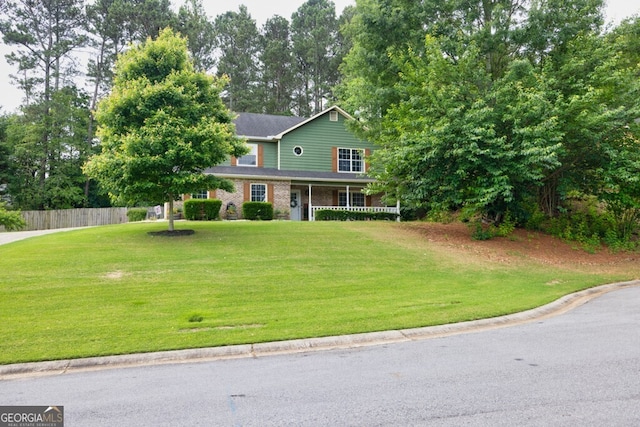 3987 Ivory Gables Pl, Buford, GA 30519 - view of front facade with covered porch and brick siding