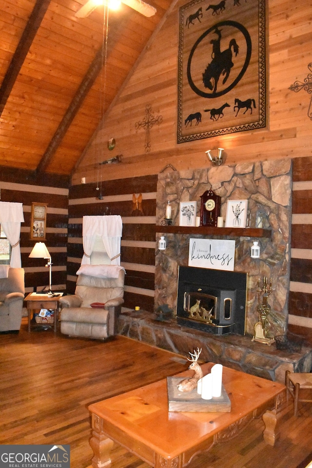 6503 Old Macon Hwy, Rex, GA 30273 - living area with wooden walls, vaulted ceiling with beams, wood finished floors, and wood ceiling