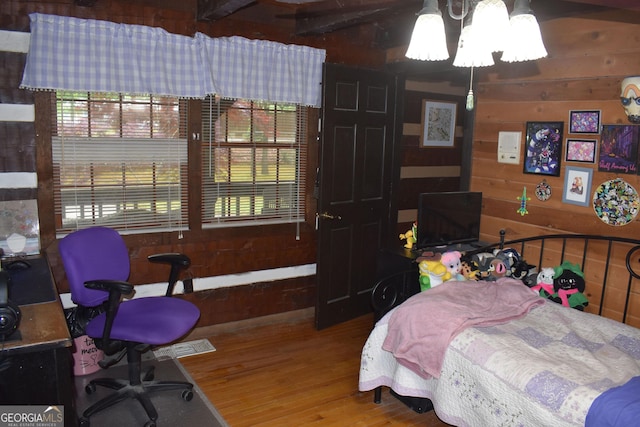 6503 Old Macon Hwy, Rex, GA 30273 - bedroom with wood walls and wood finished floors