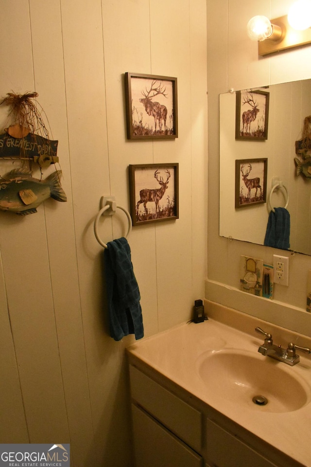 6503 Old Macon Hwy, Rex, GA 30273 - bathroom featuring a decorative wall and vanity