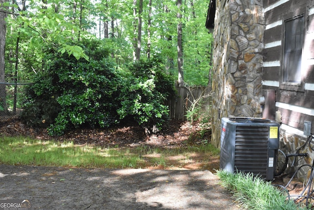 6503 Old Macon Hwy, Rex, GA 30273 - view of yard featuring cooling unit and fence