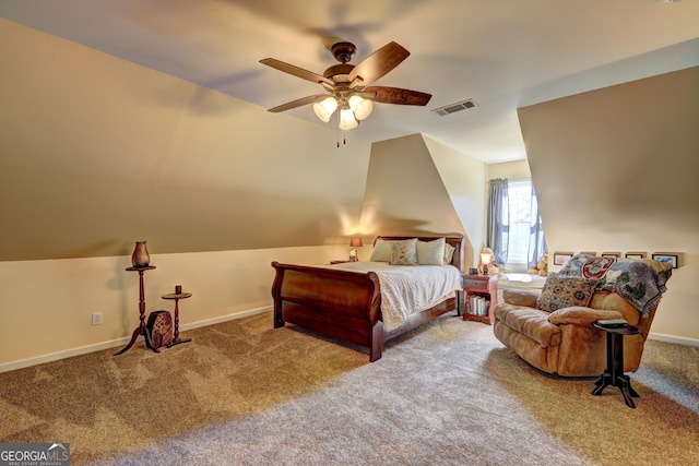 carpeted bedroom with a ceiling fan, visible vents, lofted ceiling, and baseboards