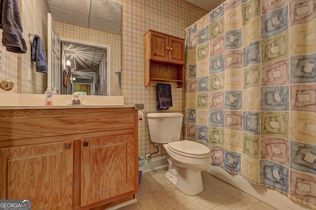 full bath with a shower with curtain, wallpapered walls, toilet, and tile patterned flooring