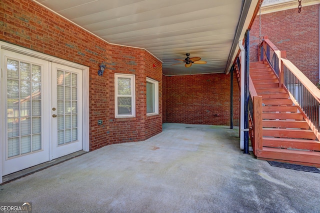 view of patio featuring french doors, ceiling fan, and stairs