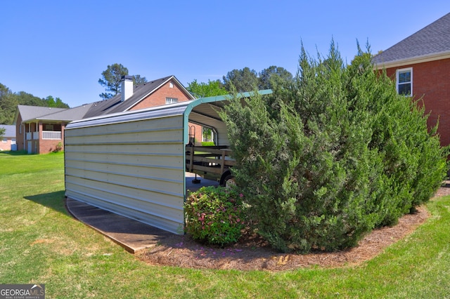 view of outbuilding featuring a detached carport