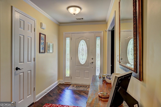 entrance foyer featuring ornamental molding, visible vents, dark wood-style flooring, and baseboards