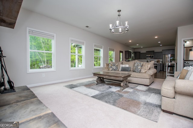 405 Adler Pt, Carrollton, GA 30117 - living area featuring a chandelier, recessed lighting, and light colored carpet