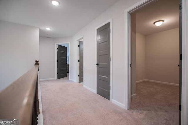 405 Adler Pt, Carrollton, GA 30117 - corridor featuring light carpet, recessed lighting, and an upstairs landing