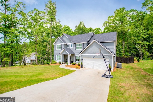 view of front of house featuring driveway, cooling unit, board and batten siding, a garage, and roof with shingles