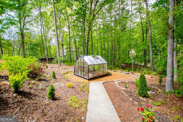 405 Adler Pt, Carrollton, GA 30117 - view of yard featuring an exterior structure and an outdoor structure