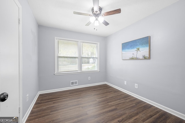 2352 S Hairston Rd, Decatur, GA 30035 - unfurnished room featuring visible vents, a ceiling fan, baseboards, and dark wood-style floors