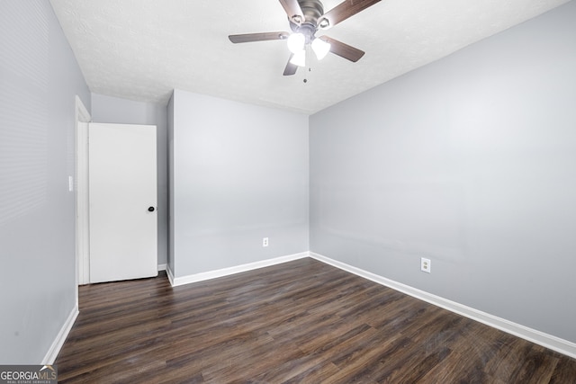 2352 S Hairston Rd, Decatur, GA 30035 - unfurnished room with a ceiling fan, baseboards, and dark wood finished floors
