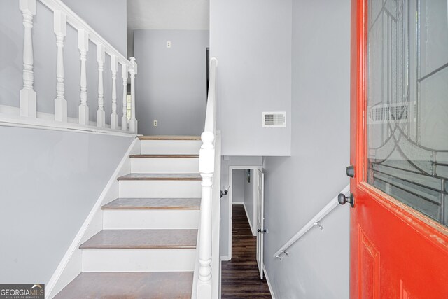 2352 S Hairston Rd, Decatur, GA 30035 - stairway featuring wood finished floors and visible vents