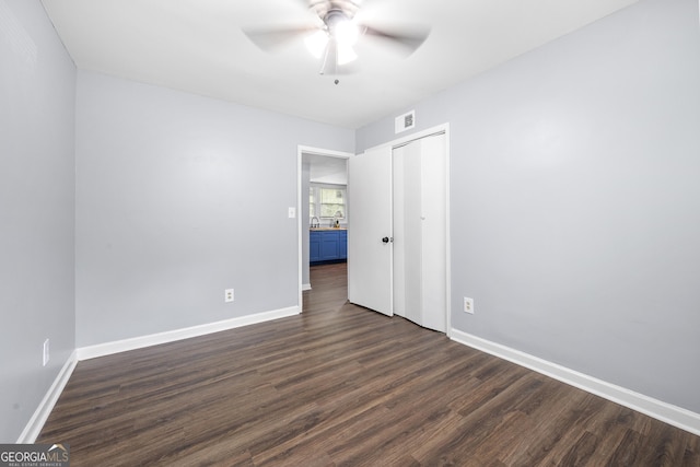 2352 S Hairston Rd, Decatur, GA 30035 - spare room featuring ceiling fan, visible vents, dark wood-style floors, and baseboards
