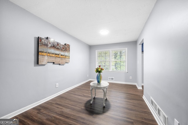 2352 S Hairston Rd, Decatur, GA 30035 - interior space with visible vents, baseboards, and dark wood-type flooring