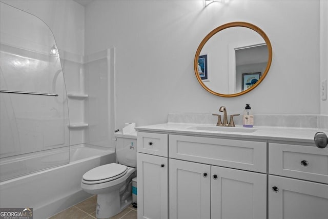 bathroom featuring toilet, vanity, tile patterned floors, and shower / bathing tub combination