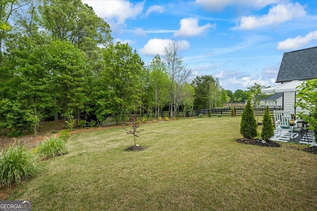 view of yard featuring fence