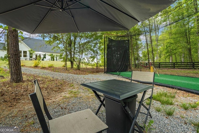surrounding community featuring fence