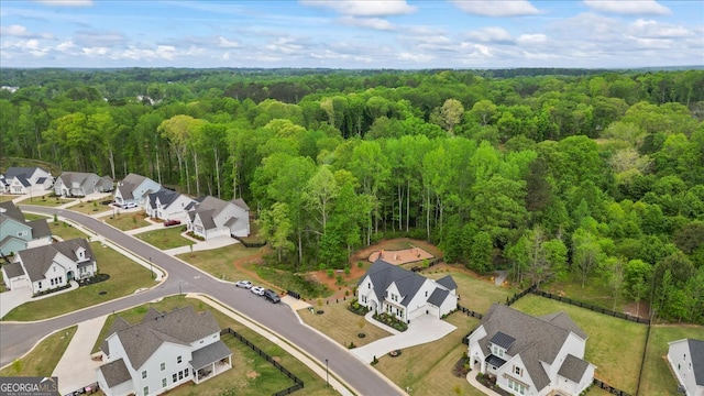 bird's eye view with a residential view and a view of trees
