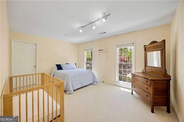 5655 Errol Pl NW, Atlanta, GA 30327 - carpeted bedroom featuring visible vents and baseboards