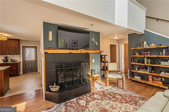 227 River Ridge Rd S, Dahlonega, GA 30533 - kitchen featuring stainless steel appliances, a healthy amount of sunlight, a sink, a peninsula, and tasteful backsplash