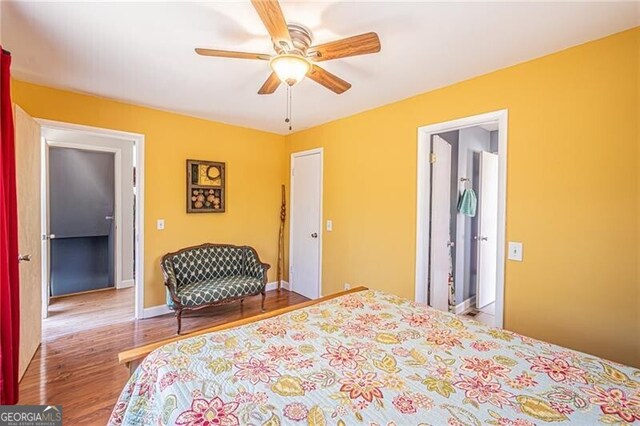 227 River Ridge Rd S, Dahlonega, GA 30533 - kitchen featuring a sink, backsplash, a peninsula, appliances with stainless steel finishes, and light stone countertops