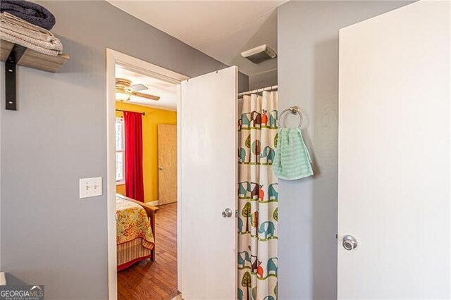 227 River Ridge Rd S, Dahlonega, GA 30533 - living room with hardwood / wood-style floors, a tile fireplace, and ceiling fan