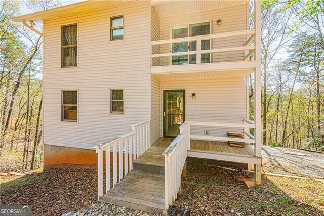 227 River Ridge Rd S, Dahlonega, GA 30533 - view of home's exterior featuring a sunroom