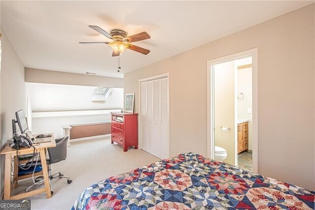 227 River Ridge Rd S, Dahlonega, GA 30533 - bedroom featuring carpet flooring, connected bathroom, a closet, and ceiling fan