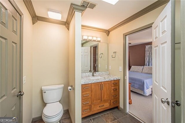 227 River Ridge Rd S, Dahlonega, GA 30533 - bathroom featuring toilet, visible vents, vanity, connected bathroom, and ornamental molding