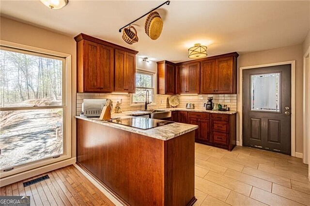 227 River Ridge Rd S, Dahlonega, GA 30533 - bedroom with wood finished floors, a ceiling fan, and baseboards