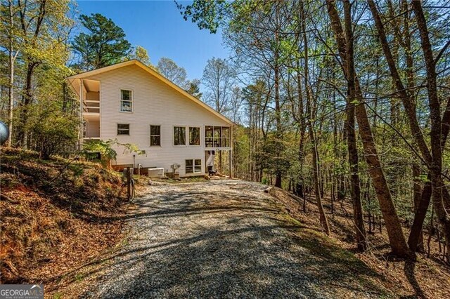 227 River Ridge Rd S, Dahlonega, GA 30533 - rear view of house featuring a sunroom