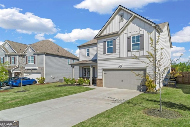 craftsman house featuring board and batten siding, an attached garage, and driveway